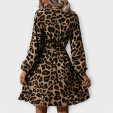 Elegantna haljina sa leopard printom, V izrezom i mašnom u struku
