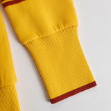 Carla - Retro Sportski Set sa Remenom u Sivo-beloj Boji sa Polu-zatvaračem i Širim Pantalonama
