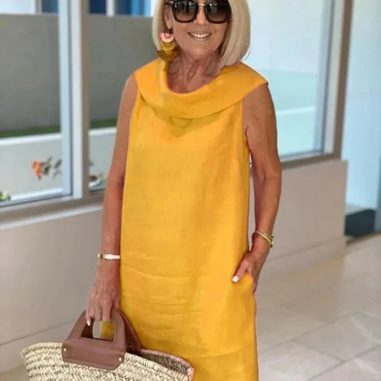 LOUISE -Elegantna haljina bez rukava s uskim krojem i laskavom siluetom
