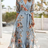 Monika - Elegantna floralna midi haljina koja prekriva stomak